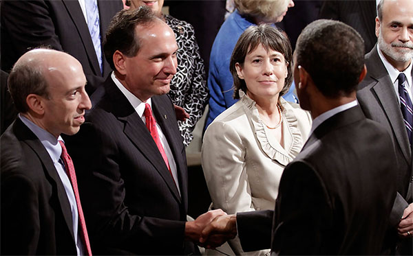 Comptroller John C. Dugan congratulating President Barack Obama Comptroller John C. Dugan congratulating President Barack Obama