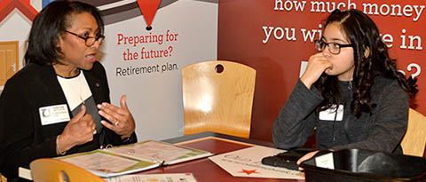 Image of Grovetta Gardineer teaching students about money management at the Junior Achievement Finance Park in Landover, Md. Image of Grovetta Gardineer teaching students about money management at the Junior Achievement Finance Park in Landover, Md.