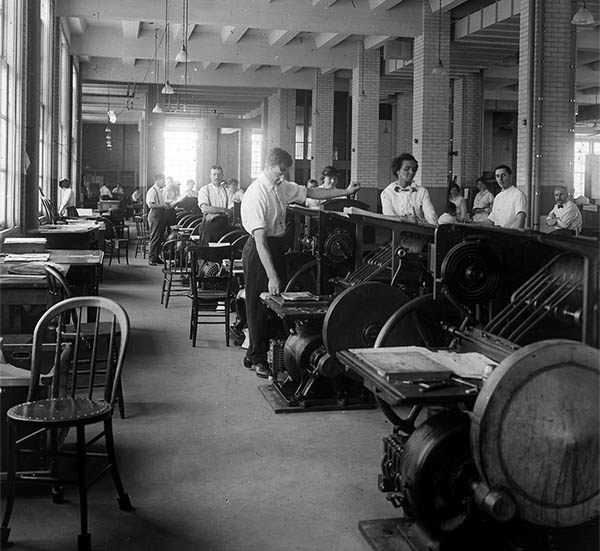 Staff printing, sealing, and printing charter number and geographical data on banknotes.